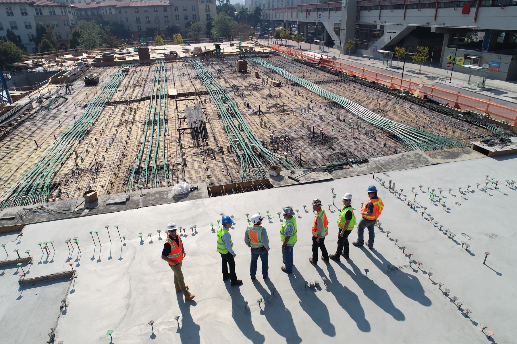 New building construction underway with concrete and structural work