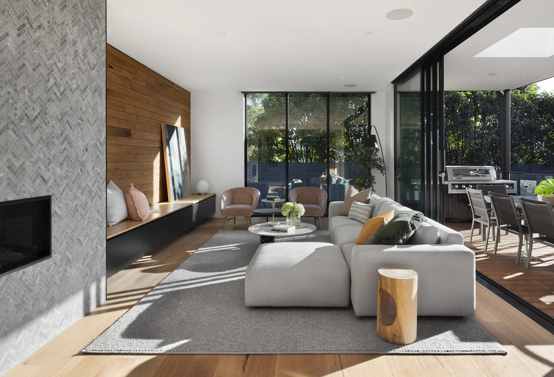 Contemporary renovated residence with natural wood and large windows